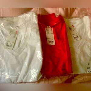 Never before worn 3-pack Uniqlo Women’s Large V-neck, 2 white and 1 orange